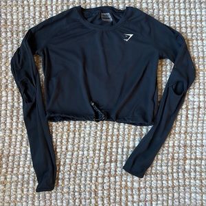 Cropped Gymshark Long Sleeve with Elbow And Thumb Holes.